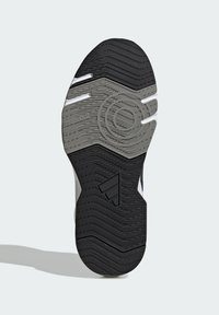 Musta ja harmaa urheilukengän pohja, jossa on kuvioitu kulutuspinta, johon kuuluu teksturoitua kumia valkoisilla korostuksilla ja logon yksityiskohdilla.