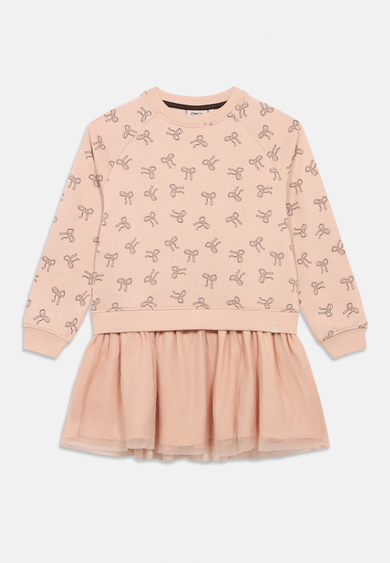 Rozā džemperu kleita ar zīmētu loku rakstu, elastīgu jostasvietu un daudzslāņu tilla svārkiem, kas piešķir papildu apjomu. Mīksta auduma tekstūra.