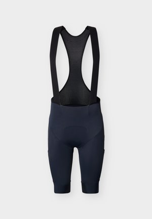 Μαύρο ποδηλατικό bib shorts με επενδυμένο κάθισμα και αναπνέουσες τιράντες από διάτρητο πλέγμα, σχεδιασμένο για άνεση και υποστήριξη.