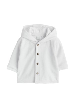 White baby hooded cardigan with long sleeves and four dark buttons down the front, made of soft terry fabric.