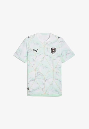 Trikot der österreichischen Fußballnationalmannschaft mit hellgrünem Marmormuster, goldenen geometrischen Linien, Puma-Logo und Teamwappen auf der Brust.