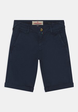 Pantalones cortos de algodón azul marino con cierre de botón, dobladillo enrollado, bolsillos frontales y pequeño detalle de logo en el lateral. Etiquetados "Vingino."