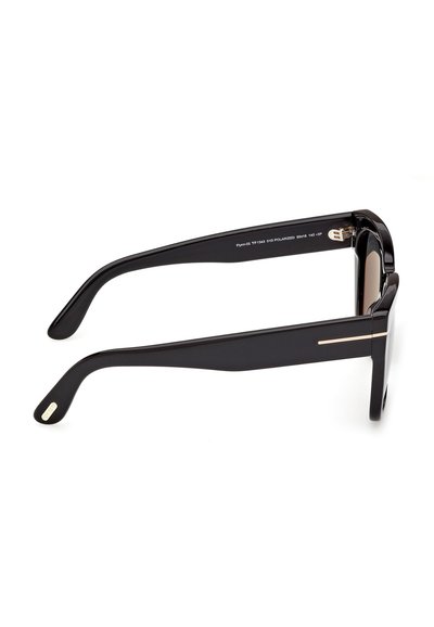 Lunettes de soleil rectangulaires surdimensionnées noires avec des branches épaisses et un subtil accent doré sur la branche.