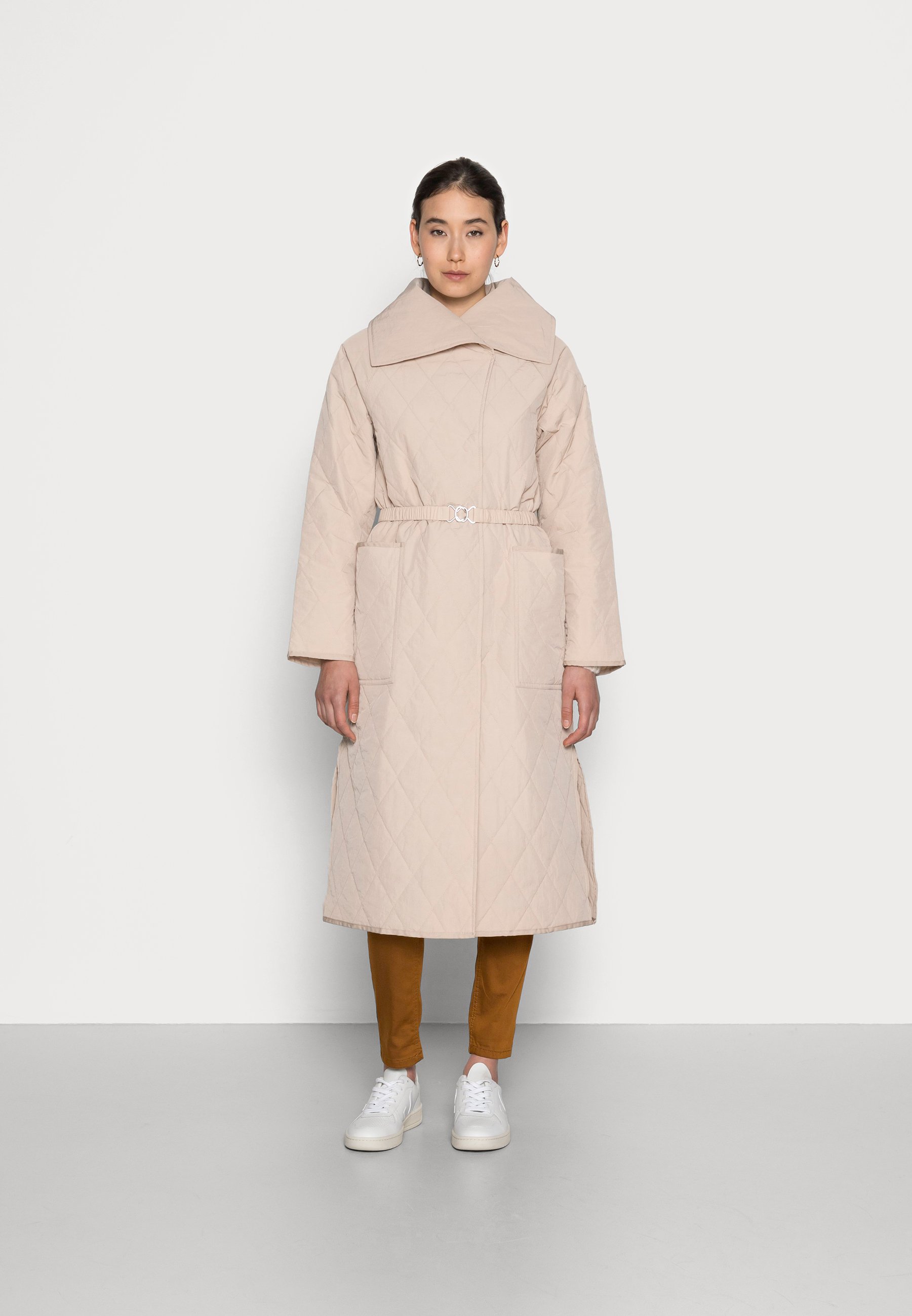 beige quilted coat