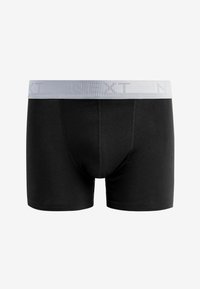 Schwarze Boxershorts aus Stretchstoff mit tailliertem Design. Mit einem grauen elastischen Bund versehen, der mit "NEXT" geprägt ist.