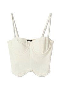 Bílý zkrácený top s tenkými nastavitelnými ramínky, s pevně strukturovaným výstřihem, zaobleným lemem se volánkovým okrajem a měkkou texturovanou tkaninou.