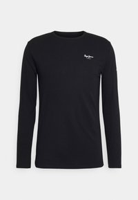 Schwarzes Langarm-T-Shirt aus glattem Baumwollstoff. Mit einem kleinen weißen Logo auf der Brust und einem runden Halsausschnitt. Einfaches und tailliertes Design.