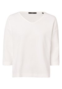 Top blanco de punto acanalado con escote en V y mangas hasta el codo, con un ajuste relajado y una etiqueta negra de la marca en el interior del cuello.