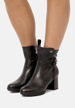 Stivaletti con plateau - marron