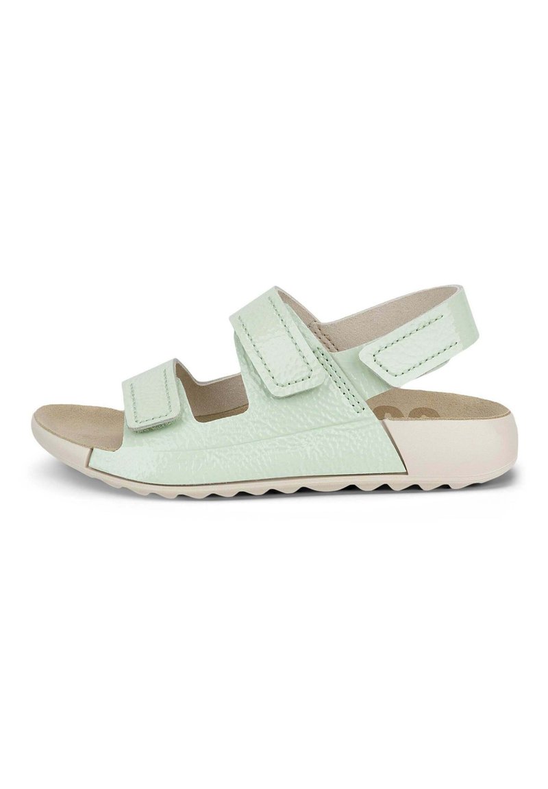 Hellgrüne Sandalen mit zwei verstellbaren Klettverschlüssen und einer strukturierten Oberseite. Sie verfügen über eine gepolsterte Innensohle und eine gummierte Sohle.