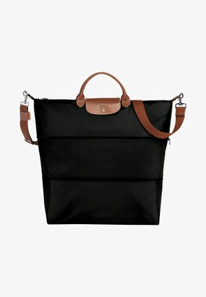 Black tote bag made of durable nylon with leather accents. Features dual handles, a detachable shoulder strap, and a zippered top closure.