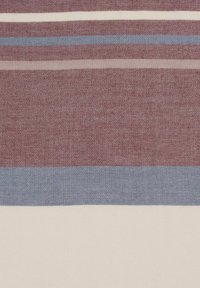 Textile fabric featuring horizontal stripes in shades of burgundy, light grey, blue, and cream. The texture is woven and slightly coarse.
