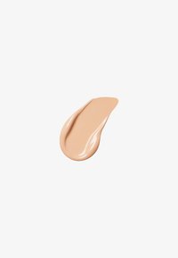 Formule crème beige avec une finition lisse et brillante ; en forme de goutte avec une légère indentation ; convient pour un mélange sur la peau.