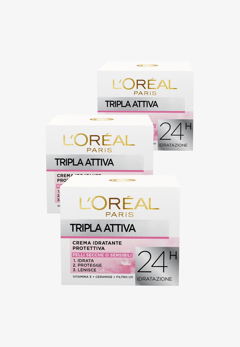 Tre scatole di crema L'Oréal Paris Triple Active, con uno sfondo bianco, testo dorato, accenti rosa e dettagli del prodotto sulla parte frontale.