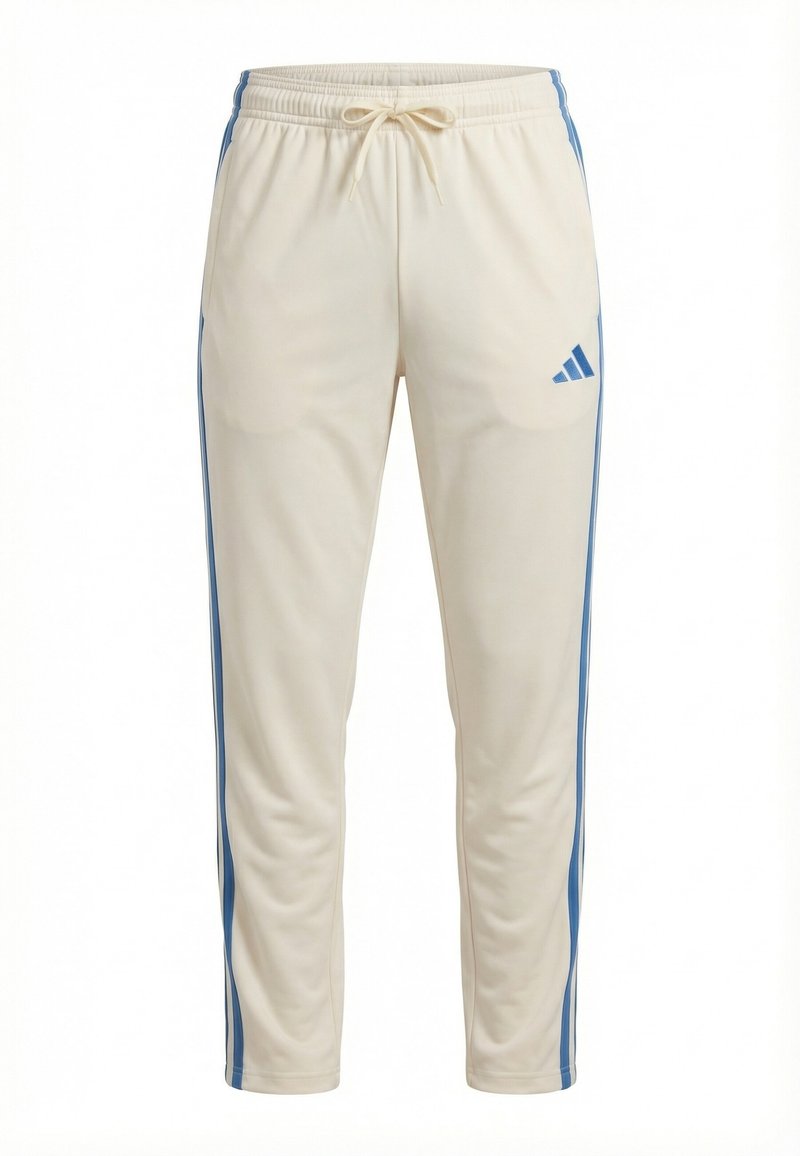 Pantaloni sportivi Adidas beige con strisce laterali blu, vita elasticizzata, coulisse e logo Adidas sulla coscia superiore.