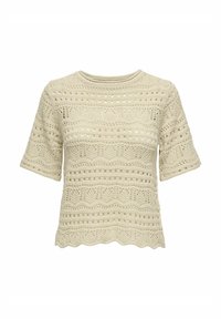 Suéter de manga corta en beige claro, tejido a ganchillo, que presenta un patrón texturizado, un dobladillo con forma de ondas y un diseño de tejido abierto con acentos circulares.