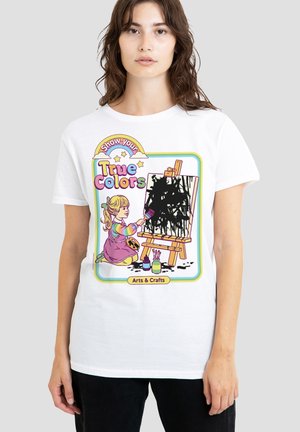 Young girl painting with black paint on easel, text "Show your True Colors" and "Arts & Crafts" on white t-shirt.