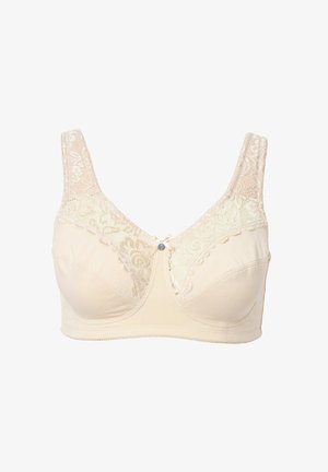 Soutien-gorge beige avec des accents en dentelle sur les bretelles et à l'avant. Présente un détail de nœud et de bouton au centre. Tissu lisse avec une texture douce.