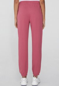 Tezenis MIT PASPELTASCHEN UND TUNNELZUG - Teplákové kalhoty - Pink