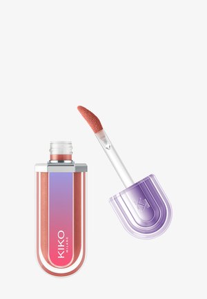 Lip gloss container with gradient purple-pink label and purple cap, showing angled applicator wand coated with shimmery pink gloss.