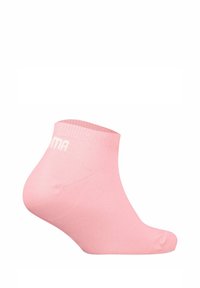 Helle rosa Knöchel-Socke mit gerippter Textur und runder Spitze. Verfügt über weiße Markenkennzeichnung auf der Oberseite. Hergestellt aus dehnbarem Material.