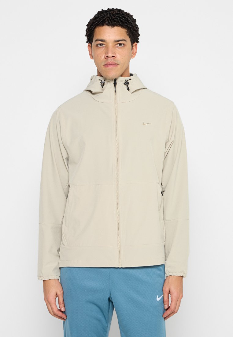 Nike Performance Regenjas kaki