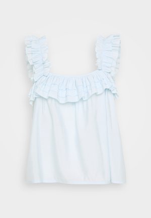 Top sem mangas azul claro com decote e ombros com babados. Feito de um tecido suave, apresenta um corte solto e uma textura lisa.