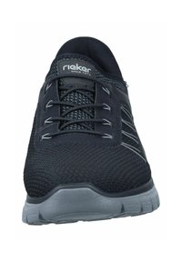 Black athletic shoe with a textured mesh upper, gray accents, and laces. Rubber sole with grip patterns for traction. Brand logo visible.