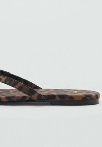 Leopard print flip-flop sandals with two thin crossover straps, a textured footbed, and a solid black sole.