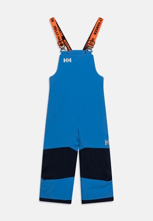 Pantalones de nieve impermeables de color azul con tirantes ajustables en naranja y negro, que cuentan con un panel navy en la parte inferior de las piernas. Logotipo de Helly Hansen visible.