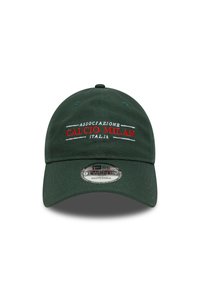 Dark green adjustable cap featuring embroidered "ASSOCIAZIONE CALCIO MILAN ITALIA" text in red and white on the front panel.