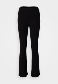 Pantalons évasés tricotés noirs avec texture en côtes, taille élastique et ourlet festonné en bas, conçus pour une silhouette ajustée.