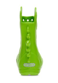 Zuecos de goma verdes con una superficie texturizada, púas en la parte trasera que asemejan una cola de dinosaurio y un diseño de ventilación circular cerca de la parte superior.