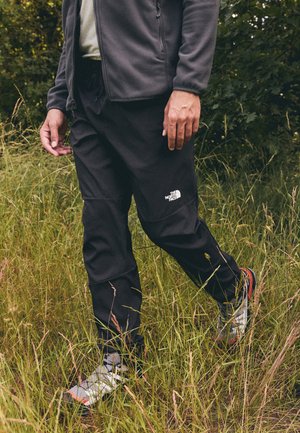 The North Face MOUNTAIN ATHLETICS WIND PANT - Outdoor-Hose - black