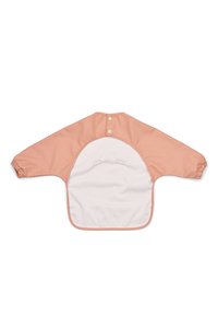 Brzoskwiniowo-biała bluzka z długim rękawem, zakończona elastycznymi mankietami i zapinana na guziki z tyłu. Wykonana z wodoodpornego materiału o gładkiej fakturze.