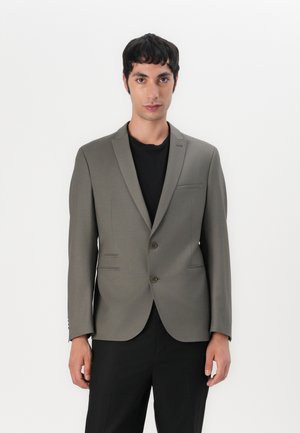 Olive green tailored blazer made of smooth fabric, featuring two buttons, a single chest pocket, and two front flap pockets.