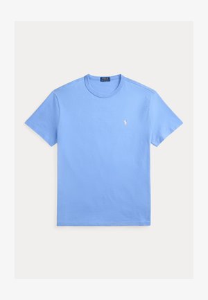 Ljusblå kortärmad t-shirt i bomull med rund halsringning och en liten vit Ralph Lauren Polo-logotyp broderad på vänster bröst.