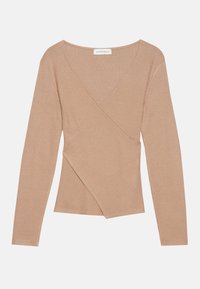 Beige gerippter Langarmoberteil mit tiefem V-Ausschnitt und überkreuztem Frontdesign. Weicher Stoff und figurbetonte Form betonen die Elastizität des Materials.