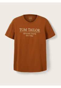 Tričko s krátkým rukávem a kulatým výstřihem v odstínu rezavě oranžové, vyrobené z organické bavlny. Na přední straně je potisk "TOM TAILOR GENUINE CRAFTS EST // 1962" v krémové barvě.