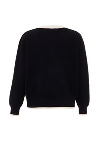 Maglione lavorato a maglia blu navy con motivo testurizzato, colletto e polsini a contrasto crema, e una vestibilità rilassata.