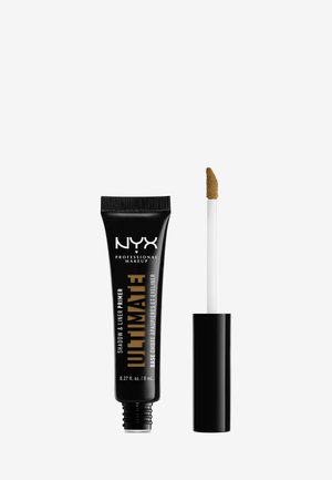 Tube compressé noir de NYX Ultimate Shadow & Liner Primer avec des lettres dorées. Comprend un applicateur blanc avec une pointe effilée.