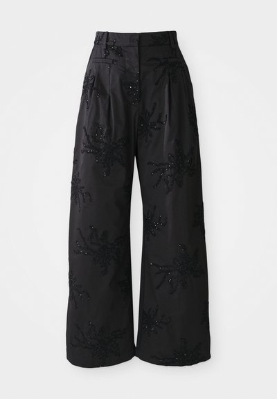 Black wide-leg trousers with sequin floral embellishments, featuring a high waist, pleats, and side pockets for a textured look.