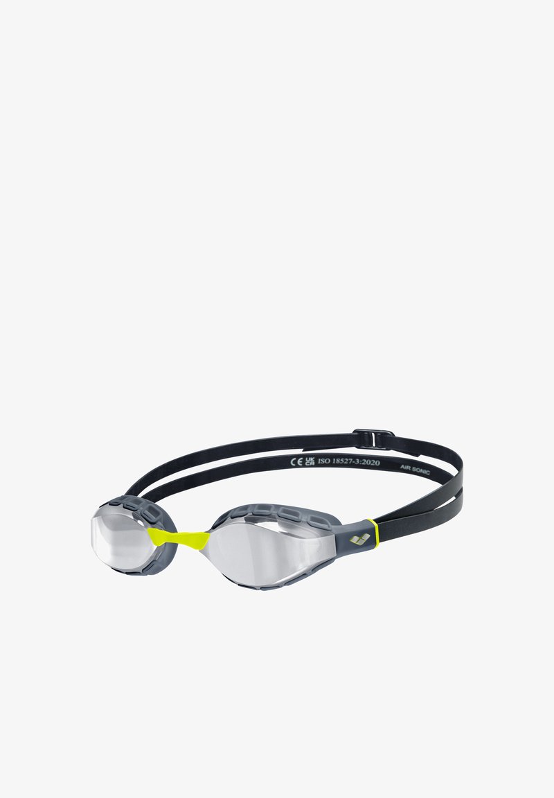 Swimming goggles with clear lenses, gray rubber frame, and adjustable black strap featuring a yellow accent. Smooth, hydrodynamic design.