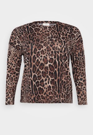 Halenka s dlouhým rukávem v leopardím vzoru s odstíny hnědé, černé a béžové. Měkká textura s uvolněným střihem.