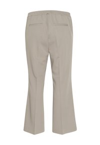 Beige, široké kalhoty vyrobené z hladké tkaniny s elastickým pasem, mají dvě zadní kapsy a čisté, strukturované linie.