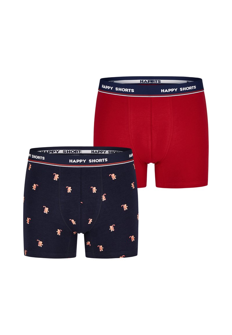 Twee paar heren boxershorts. Leveren één in effen rood, de andere in marineblauw met kleine herhaalde peperkoekmannetjespatronen. Beide hebben een zwarte tailleband.