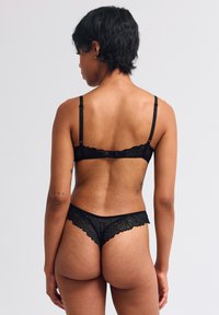 Erlich Textil FLUID BRAZIL - String - schwarz