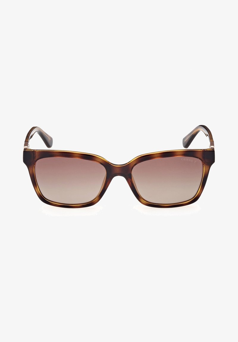 Occhiali da sole tartarugati con montatura quadrata, lenti sfumate e sottili bracci curvi. La vista frontale mette in evidenza la forma e il colore distintivi.