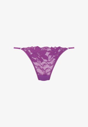 Purple lace thong featuring floral pattern, mesh design, adjustable side straps, and a solid fabric waistband for comfort.