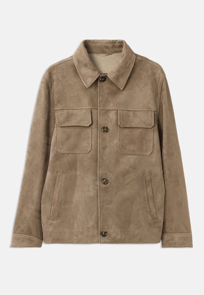 Brown suede jacket with a collared neckline, two front chest pockets, and two side pockets. Features button closures and a smooth texture.